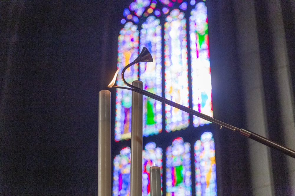 A Candle Being Lit at Duke Chapel