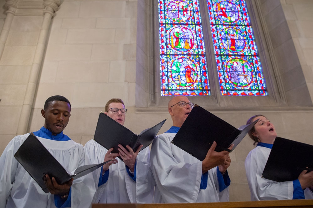 Members of the Duke Chapel Choir singing during a worship service.