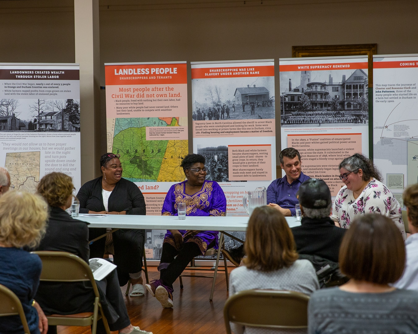 Chapel Community Minister Rev. Breana van Velzen moderates at panel discussion at the Uneven Ground exhibit.