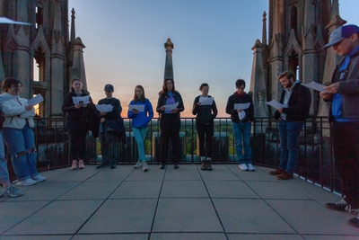Students praying on top of the Duke Chapel tower