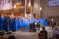 The Duke Chapel Choir sings with Dr. Zebulon Highben conducting during a concert.