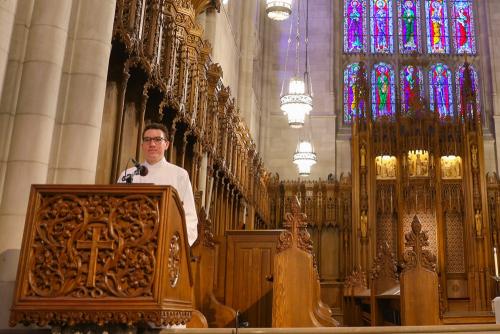 Jonathan Avendano standing as a lector